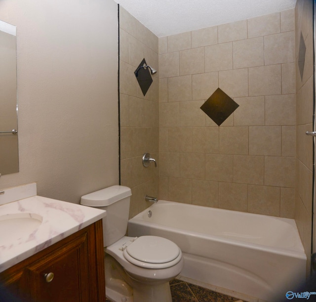 bathroom featuring vanity, tile patterned floors, toilet, and tub / shower combination