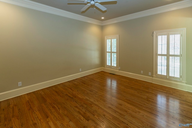 spare room featuring ornamental molding, ceiling fan, and hardwood / wood-style floors