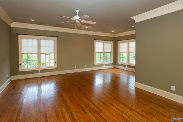 unfurnished room with crown molding, light wood-type flooring, and ceiling fan