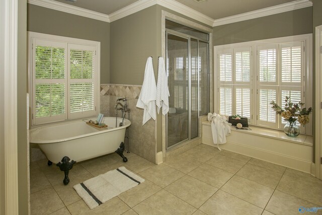 bathroom featuring crown molding, tile patterned floors, and plus walk in shower