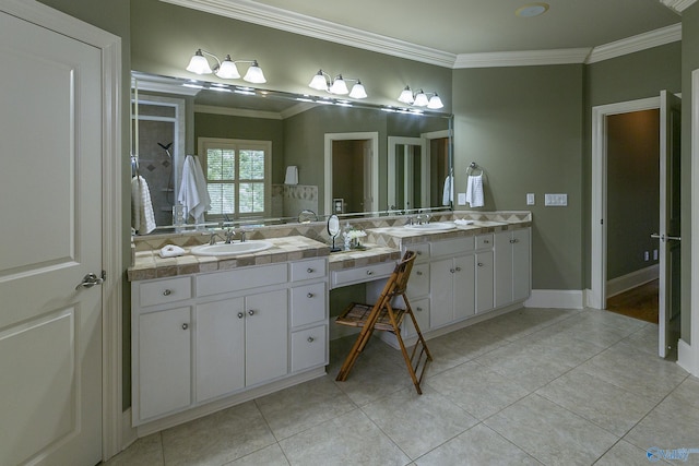 bathroom featuring ornamental molding, vanity, and tile patterned floors