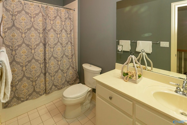 full bathroom with tile patterned floors, toilet, vanity, and shower / tub combo with curtain