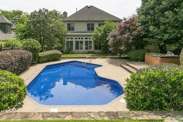 pool featuring a patio