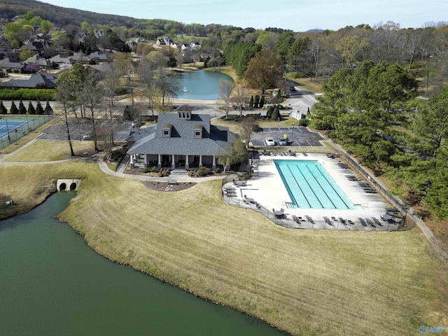 birds eye view of property featuring a water view