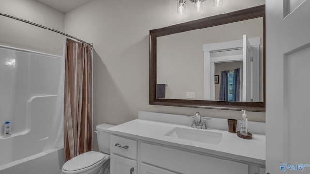 bathroom featuring shower / bath combo with shower curtain, vanity, and toilet