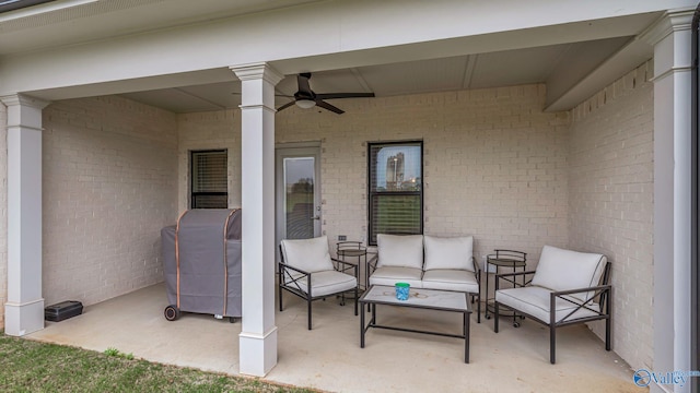 view of patio / terrace with an outdoor living space and a ceiling fan