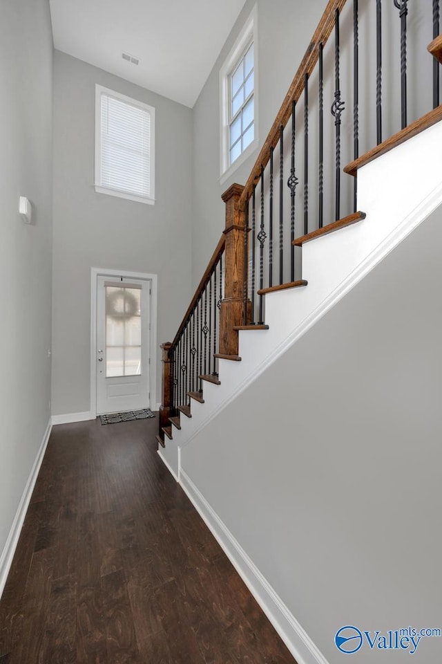 entryway with wood-type flooring