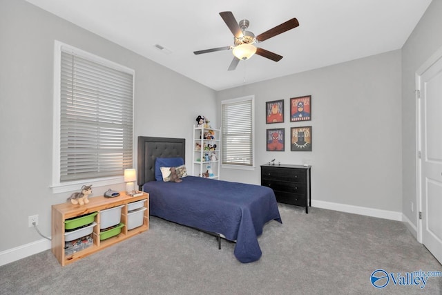 carpeted bedroom featuring ceiling fan