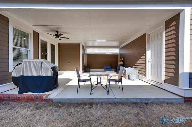 view of patio / terrace with area for grilling and ceiling fan