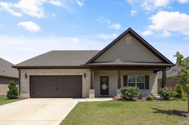 165 Saddle St, New Market, AL 35761 - view of front of property featuring brick siding, a front lawn, a garage, concrete driveway, and roof with shingles