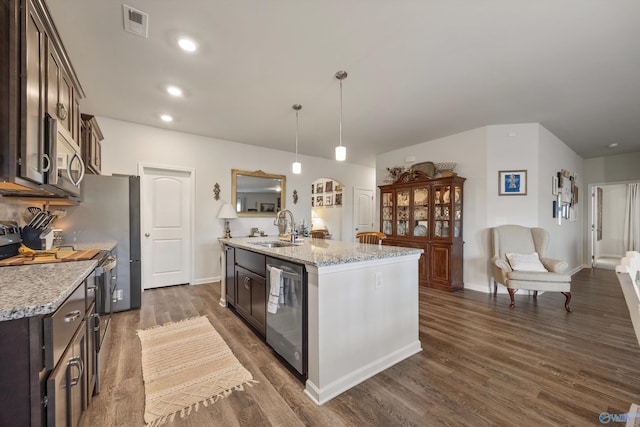 165 Saddle St, New Market, AL 35761 - kitchen featuring dark brown cabinetry, stainless steel appliances, dark wood-type flooring, and recessed lighting