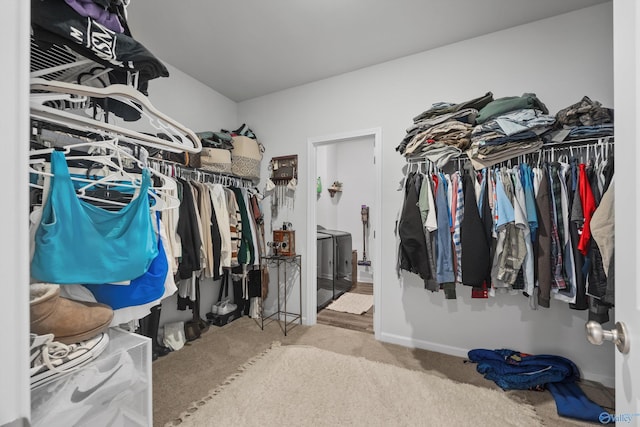 165 Saddle St, New Market, AL 35761 - walk in closet featuring separate washer and dryer and carpet floors