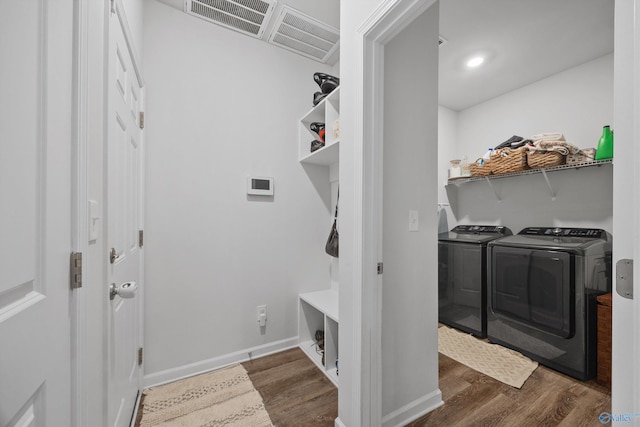165 Saddle St, New Market, AL 35761 - laundry area featuring separate washer and dryer and dark wood finished floors