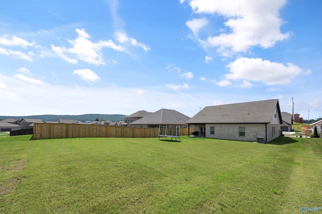 165 Saddle St, New Market, AL 35761 - view of yard featuring a trampoline