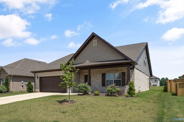 165 Saddle St, New Market, AL 35761 - view of front of home with brick siding, driveway, a garage, and a front yard