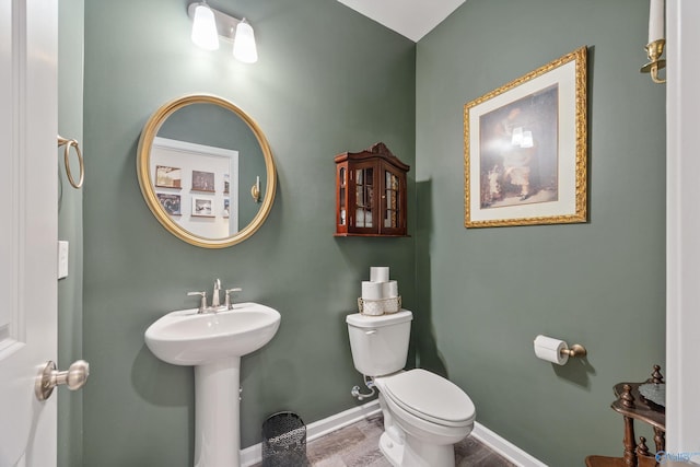 165 Saddle St, New Market, AL 35761 - half bath featuring toilet and wood finished floors