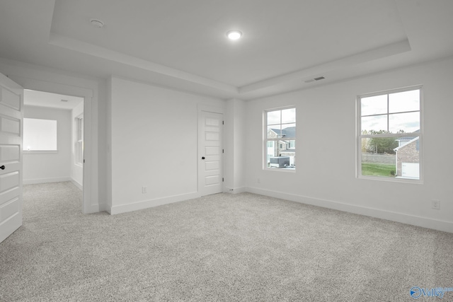 188 Chesire Cove Ln, New Market, AL 35759 - unfurnished room with a tray ceiling, carpet, baseboards, and recessed lighting