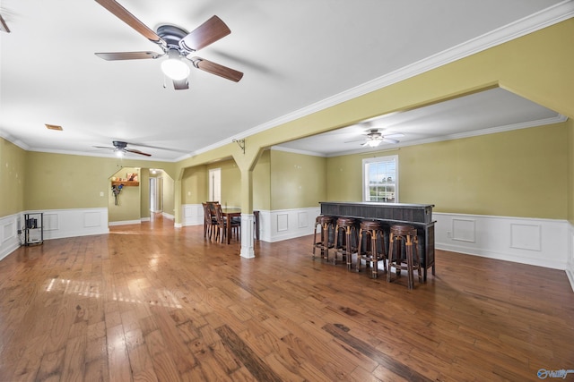 spare room featuring ornamental molding and wood-type flooring