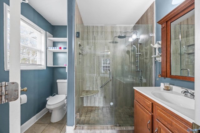 bathroom featuring tile patterned floors, toilet, and an enclosed shower