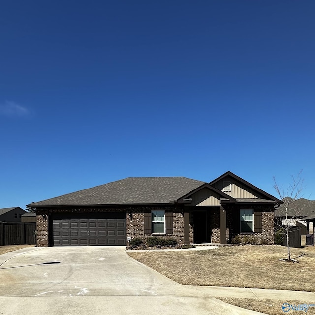 view of front of house featuring brick siding, roof with shingles, an attached garage, board and batten siding, and driveway