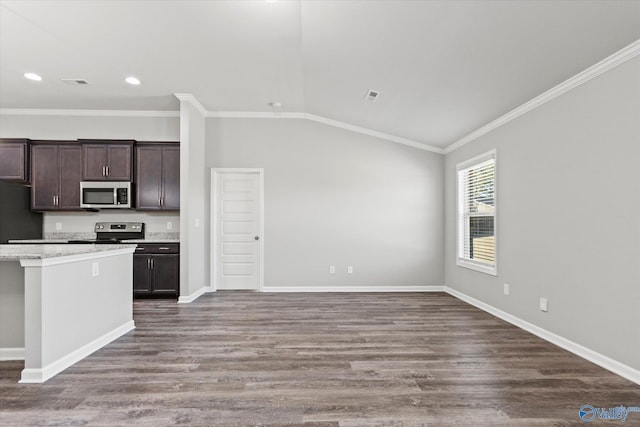 kitchen with lofted ceiling, stainless steel appliances, wood finished floors, open floor plan, and dark brown cabinets