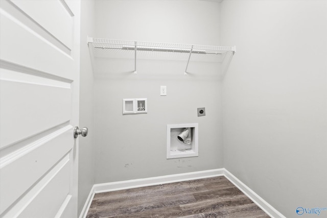 clothes washing area with laundry area, dark wood-type flooring, washer hookup, baseboards, and electric dryer hookup