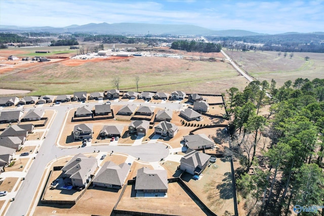 birds eye view of property featuring a residential view and a mountain view