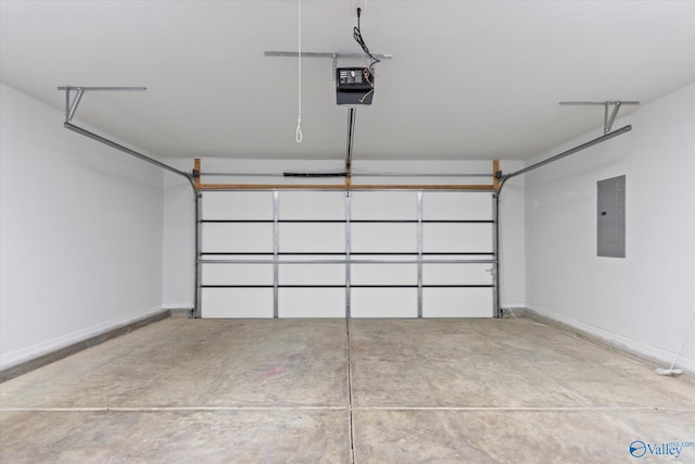 garage featuring electric panel, baseboards, and a garage door opener