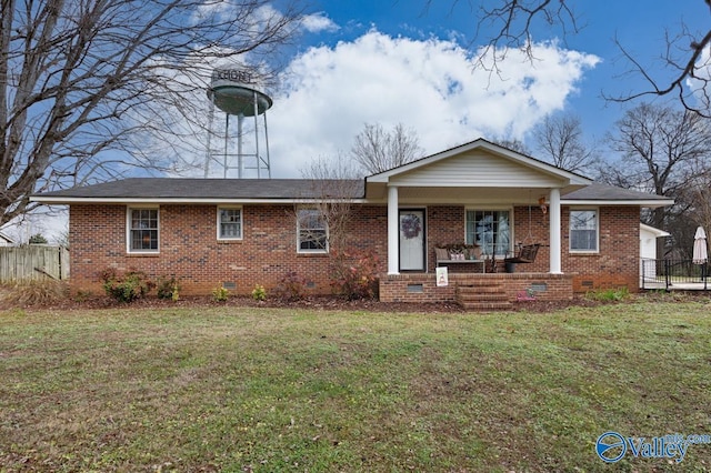 single story home with a porch and a front yard