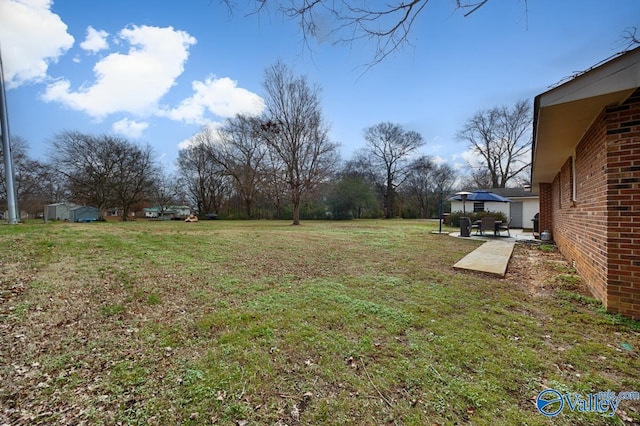 view of yard featuring a patio