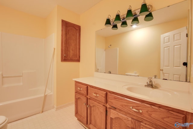 20886 Johnson Dr, Athens, AL 35613 - bathroom featuring vanity, tub / shower combination, toilet, and tile patterned floors