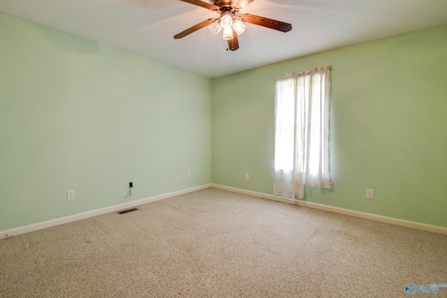 20886 Johnson Dr, Athens, AL 35613 - empty room with ceiling fan, carpet, baseboards, and visible vents