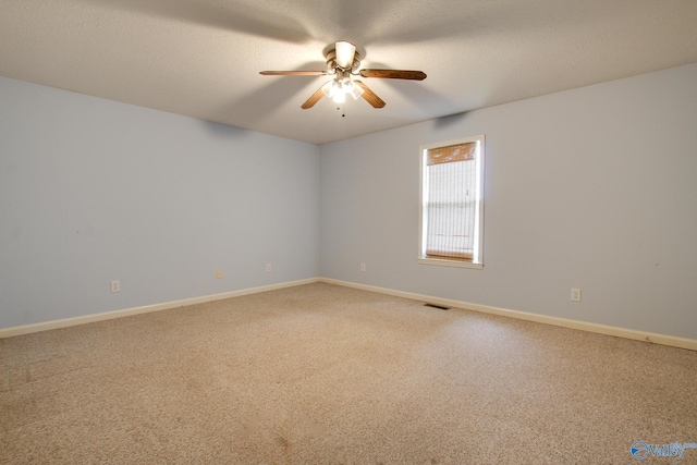20886 Johnson Dr, Athens, AL 35613 - empty room featuring light carpet, baseboards, a ceiling fan, and visible vents