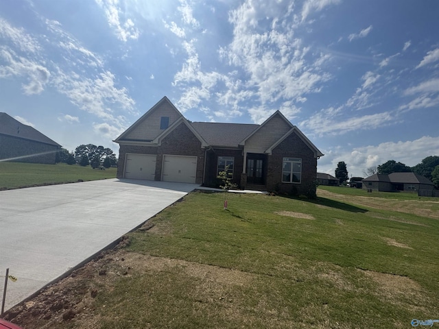 215 Dogwood Dr, Rogersville, AL 35652 - craftsman inspired home featuring driveway, a front yard, and brick siding
