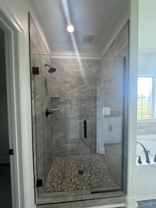 215 Dogwood Dr, Rogersville, AL 35652 - full bathroom featuring a garden tub, a stall shower, crown molding, and tile patterned floors