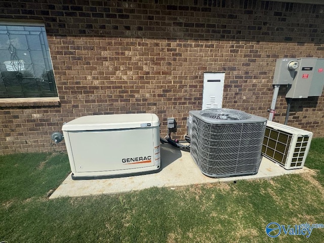 215 Dogwood Dr, Rogersville, AL 35652 - exterior view of a power unit, central AC, and brick siding