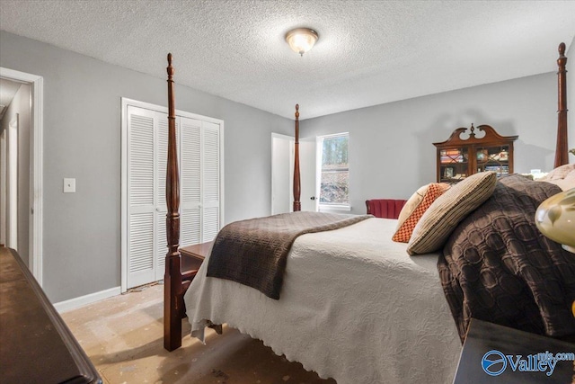 bedroom featuring a closet and a textured ceiling