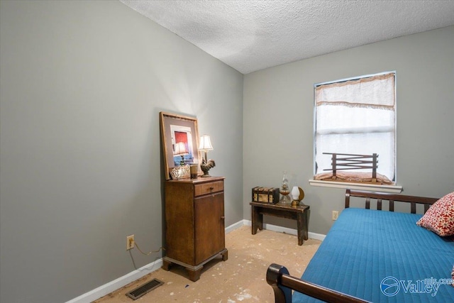 bedroom with a textured ceiling