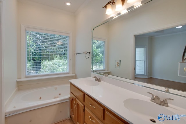 1102 Chesterfield Dr SE, Huntsville, AL 35803 - full bathroom featuring a jetted tub, double vanity, ornamental molding, and recessed lighting
