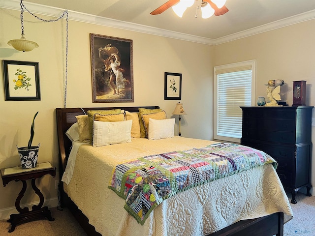 bedroom featuring crown molding, ceiling fan, and carpet floors