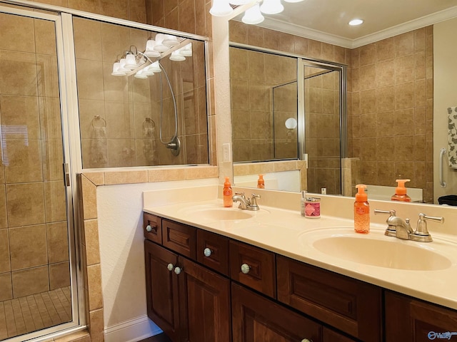 bathroom with walk in shower, ornamental molding, and vanity