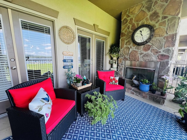 exterior space featuring an outdoor stone fireplace