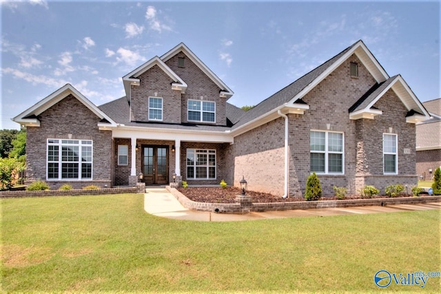 craftsman-style house with a front yard