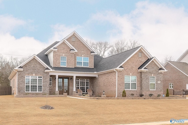 craftsman-style home with a front lawn