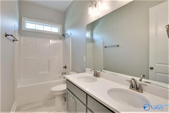 full bathroom with vanity, toilet, and bathtub / shower combination