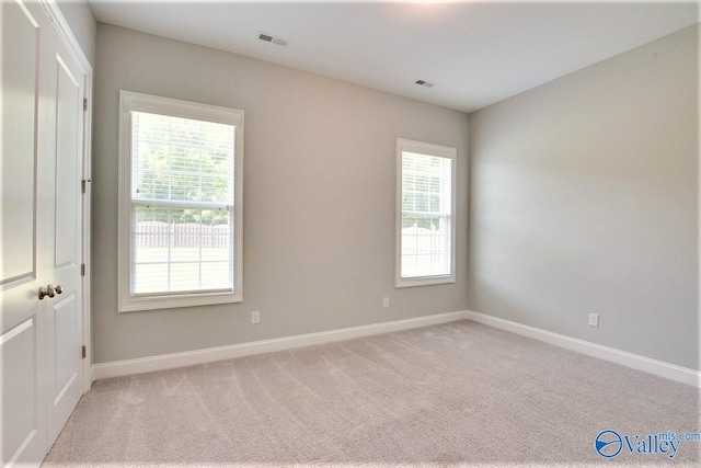 view of carpeted spare room