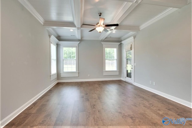 spare room featuring beamed ceiling, hardwood / wood-style flooring, ceiling fan, and a healthy amount of sunlight