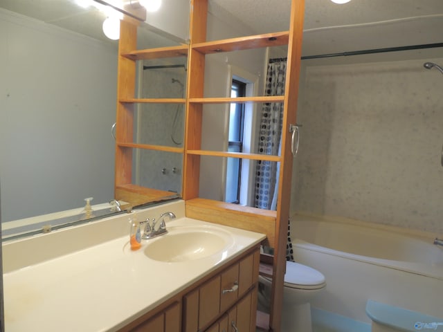 full bathroom with a textured ceiling, shower / bath combo, toilet, vanity, and ornamental molding