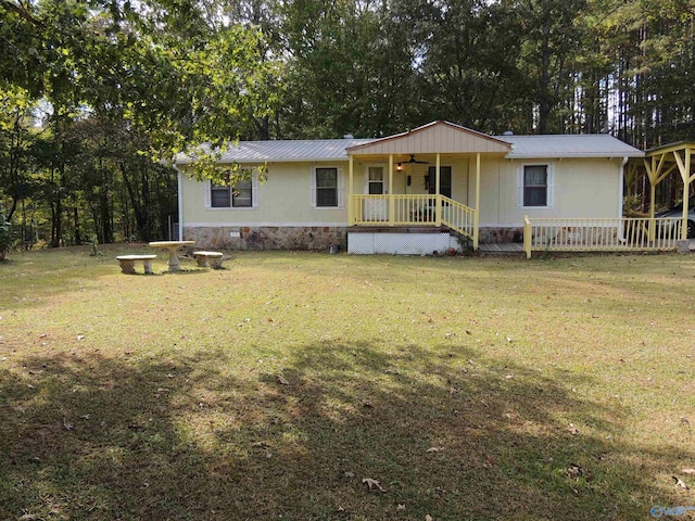 view of front of home with a front lawn and a porch