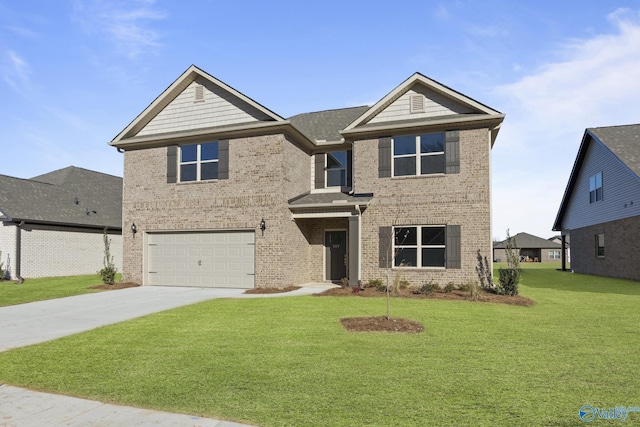 view of front of home featuring a front lawn and a garage